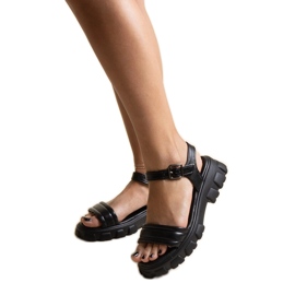 Black sandals with a massive Meredi sole