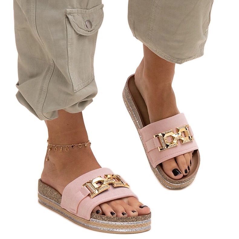 Pink flip-flops with a shiny buckle by Niamh