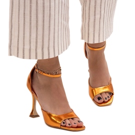 Shiny high heel sandals with a Delinda strap orange