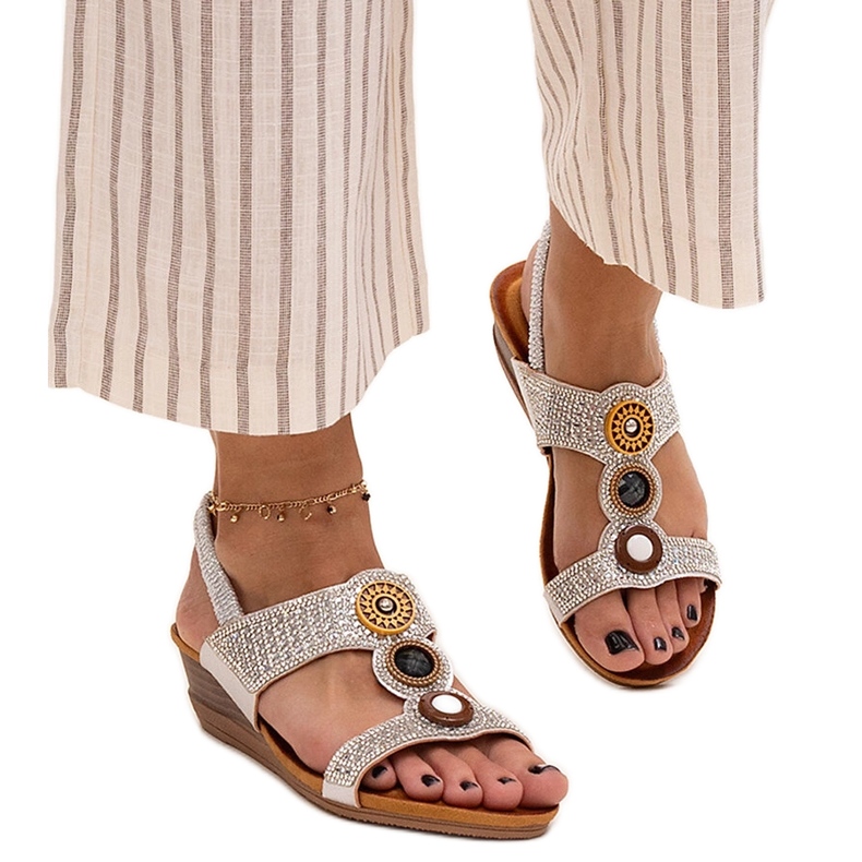 Shiny low wedge sandals by Azeeza silver