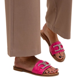 Dark pink flip-flops with a decorative buckle by Rochaela