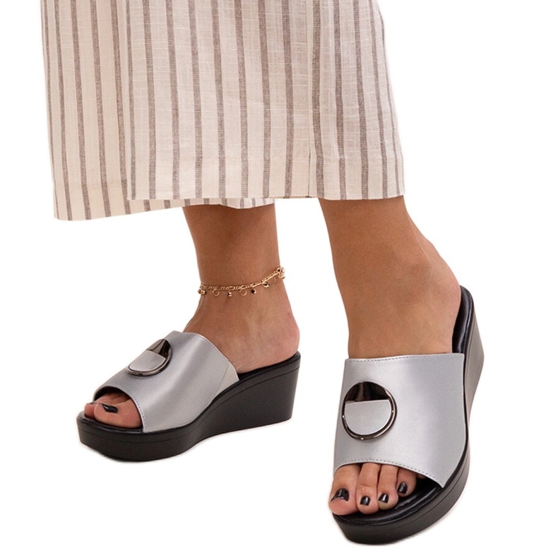 Silver wedge mules with a Keirenh buckle Silver wedge mules with a Keirenh buckle