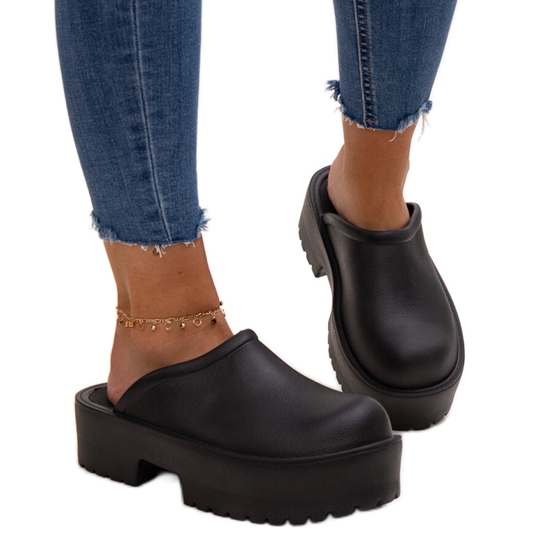 Black flip-flops with a massive Huss sole