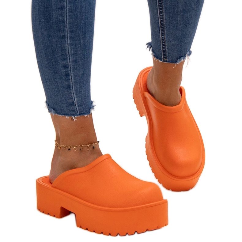 Orange flip-flops with a massive Huss sole