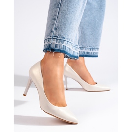 Classic white women's pumps by Sergio Leone