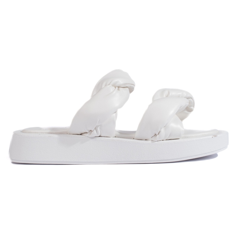 White flip-flops with a thick sole