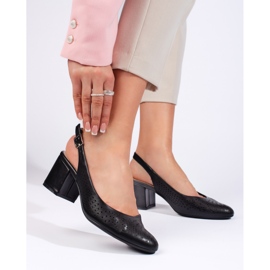 Openwork black high-heeled pumps by Sergio Leone Openwork black high-heeled pumps by Sergio Leone