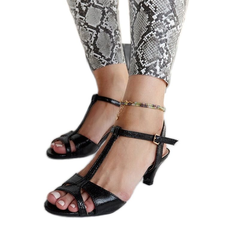 Black high heel sandals by Mislawa