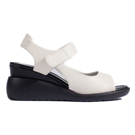 Comfortable white wedge sandals by Sergio Leone