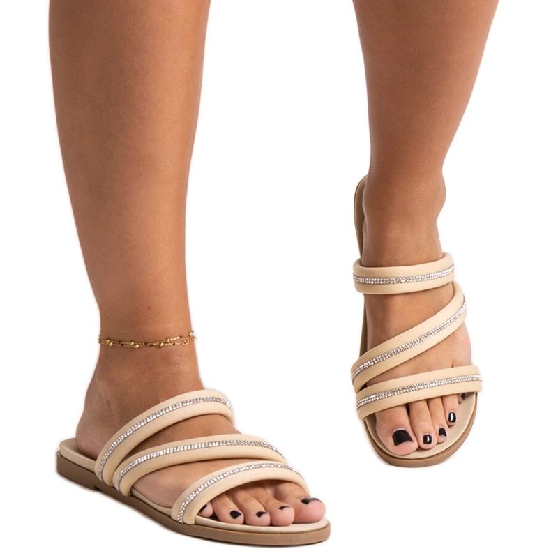 Beige flip-flops with rhinestones from Martinela Beige flip-flops with rhinestones from Martinela