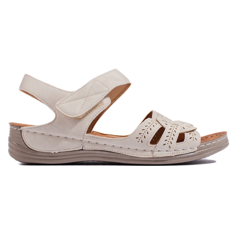 Light beige women's sandals with a low wedge