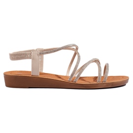 Beige slip-on sandals with rhinestones