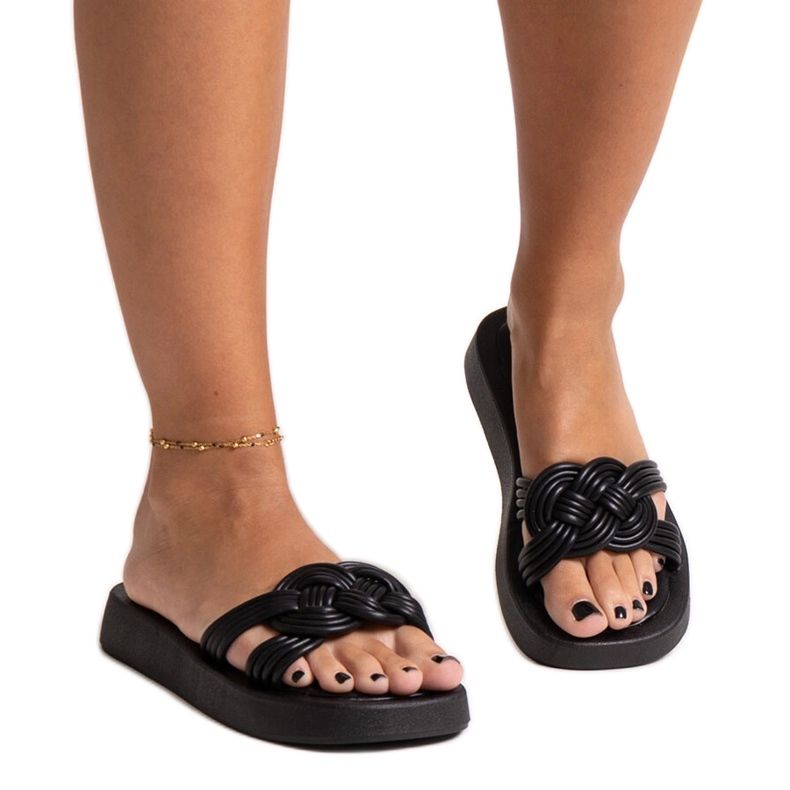 Black rubber slippers by Ferrei Black rubber slippers by Ferrei