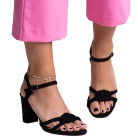 Black high-heeled sandals by Shama