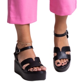 Reema black wedge sandals