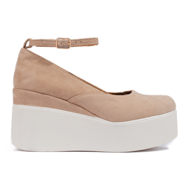 Beige wedge pumps