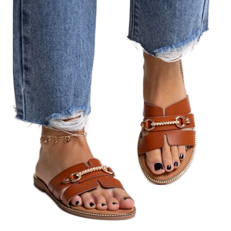 Brown flip-flops with gold accessories from Drahomíra