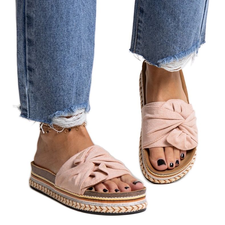 Massive pink slippers with a decorative Nibalie sole Massive pink slippers with a decorative Nibalie sole