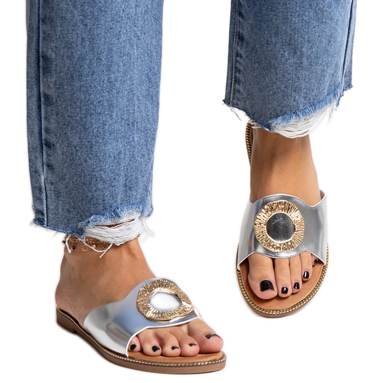 Silver flip-flops with a decorative Ganea buckle
