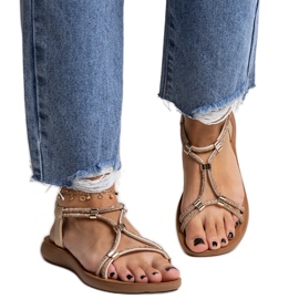 Gold sandals decorated with Leilana zircons golden