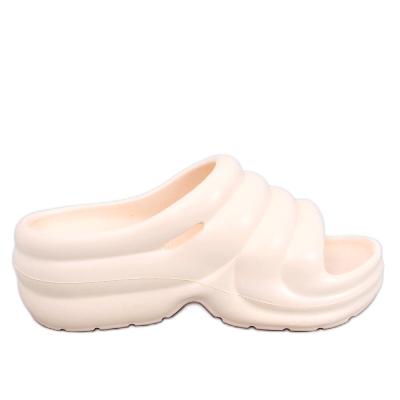 Brassie Beige foam flip-flops on the platform - light beige