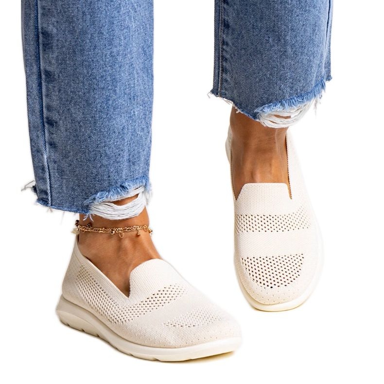 Beige sneakers with a foam sole by Rahima