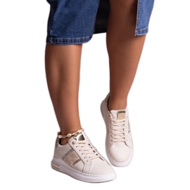 Beige sneakers decorated with Xarles zircons