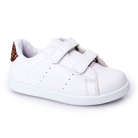 Children's white and golden sneakers