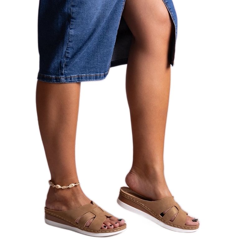 Brown lightweight low-heeled flip-flops by Mifsuda