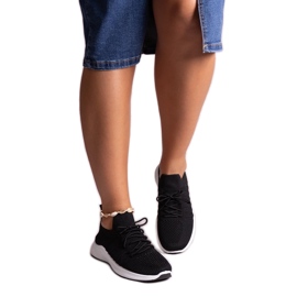 Black Muaza sports sneakers