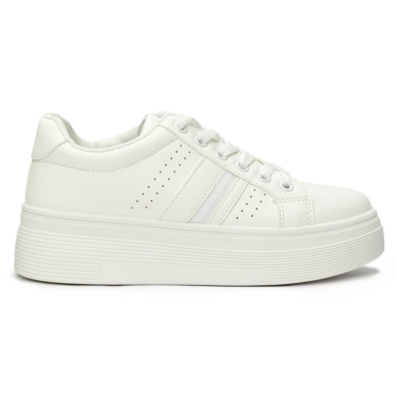 White sports sneakers on the platform