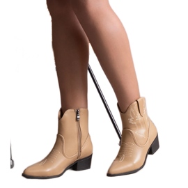 Beige cowboy boots with a heel Madia