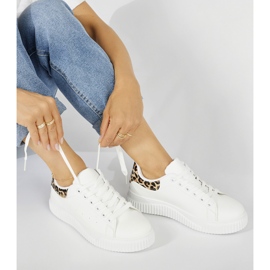 White women s sneakers with a leopard print element KeeShoes