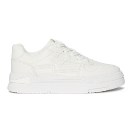 Women's white sneakers on the platform