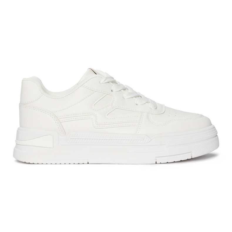 Women's white sneakers on the platform
