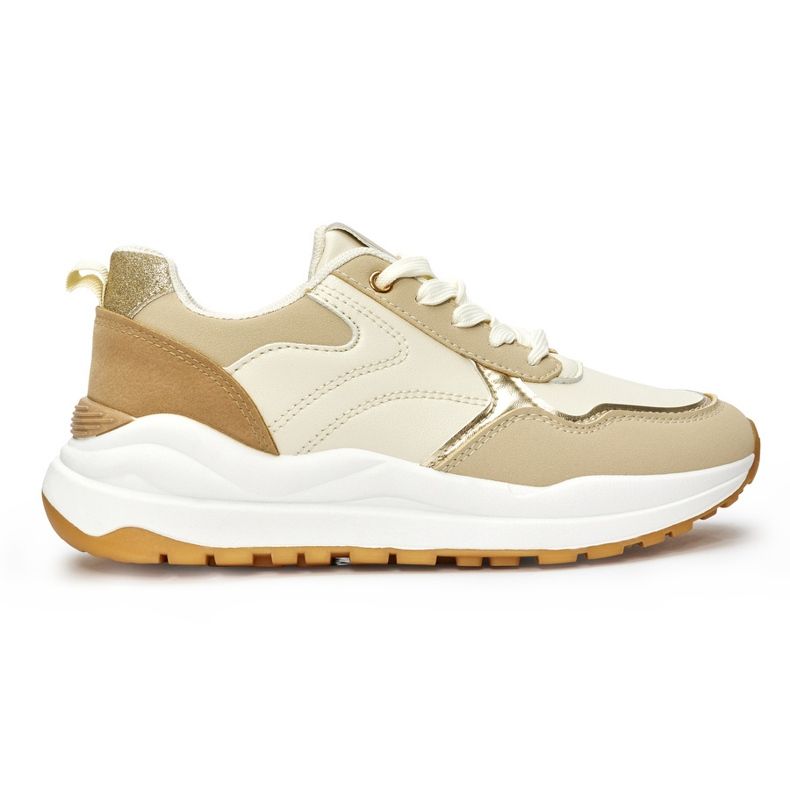 Beige women's sports shoes with a thick sole Beige women's sports shoes with a thick sole