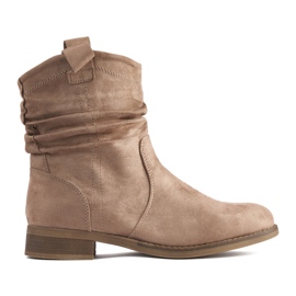 Suede beige ankle boots with ruffles