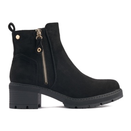 Black women's ankle boots with a decorative zipper