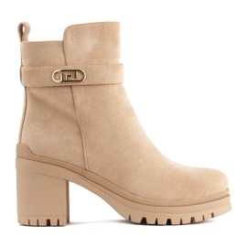 Beige women's ankle boots with a heel