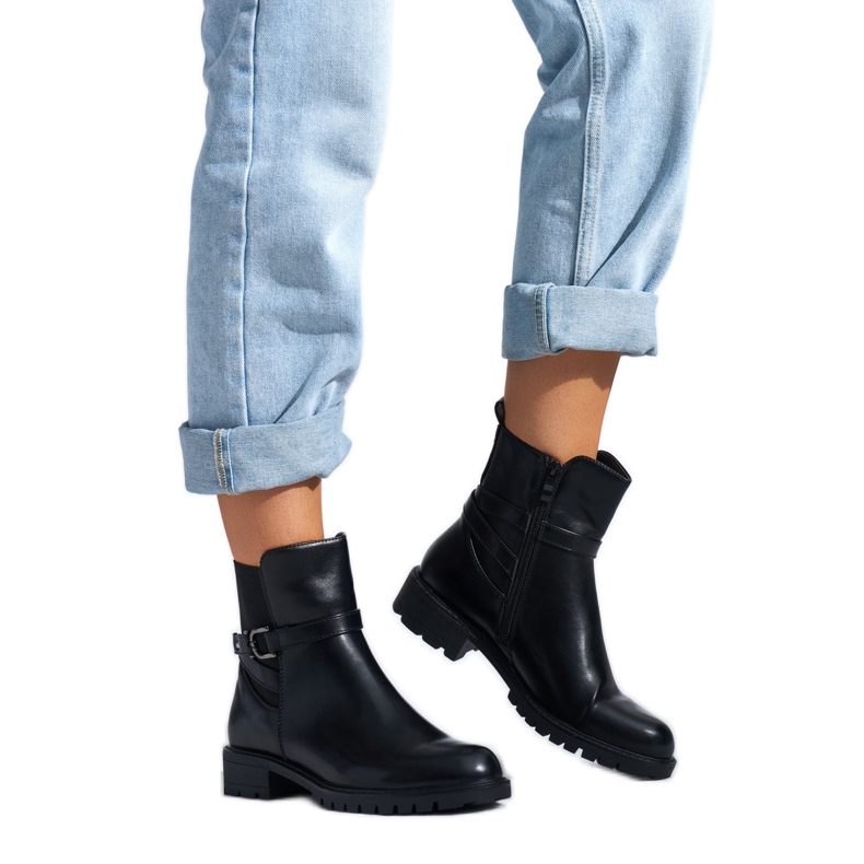 Ladies' black boots with a decorative buckle Ladies' black boots with a decorative buckle