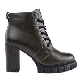 Dark green women's ankle boots with a high heel