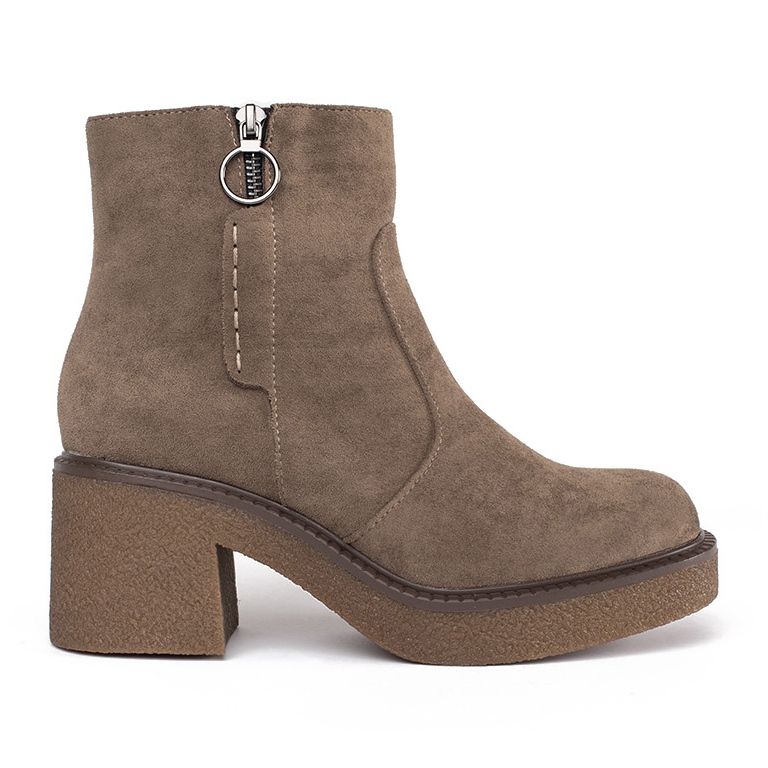 Beige suede ankle boots with a block heel by Sergio Leone