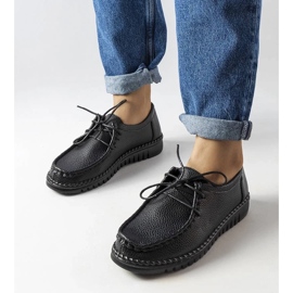 Black women's leather work boots with a thick sole, natural leather Black women's leather work boots with a thick sole, natural leather
