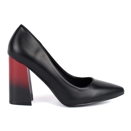 Ladies' black pumps on the post