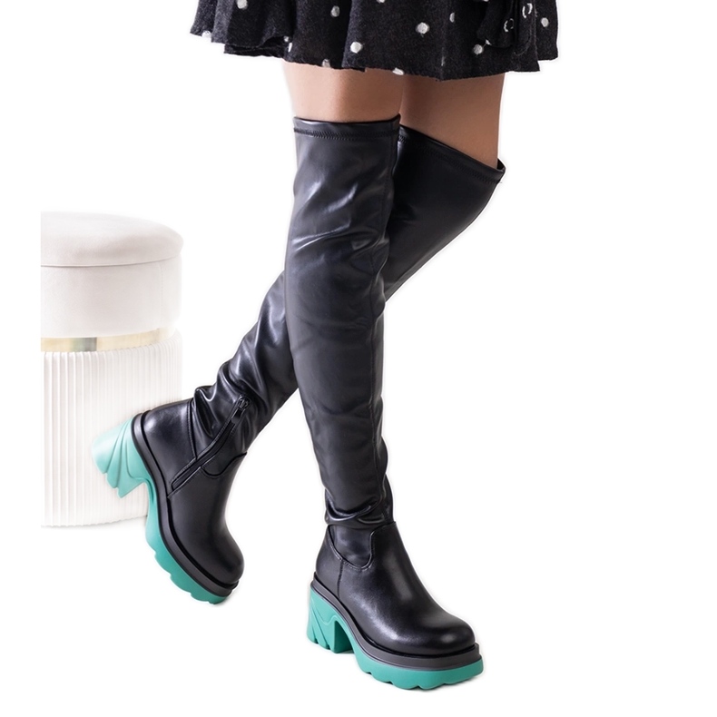 Black insulated boots with a massive Meragomi block