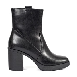 Black leather high-heeled ankle boots by Sergio Leone