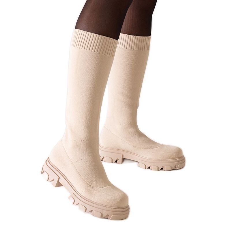 Beige fabric boots on the Nazira platform