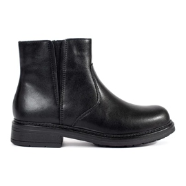 Black leather Chelsea boots with a flat sole by Sergio Leone
