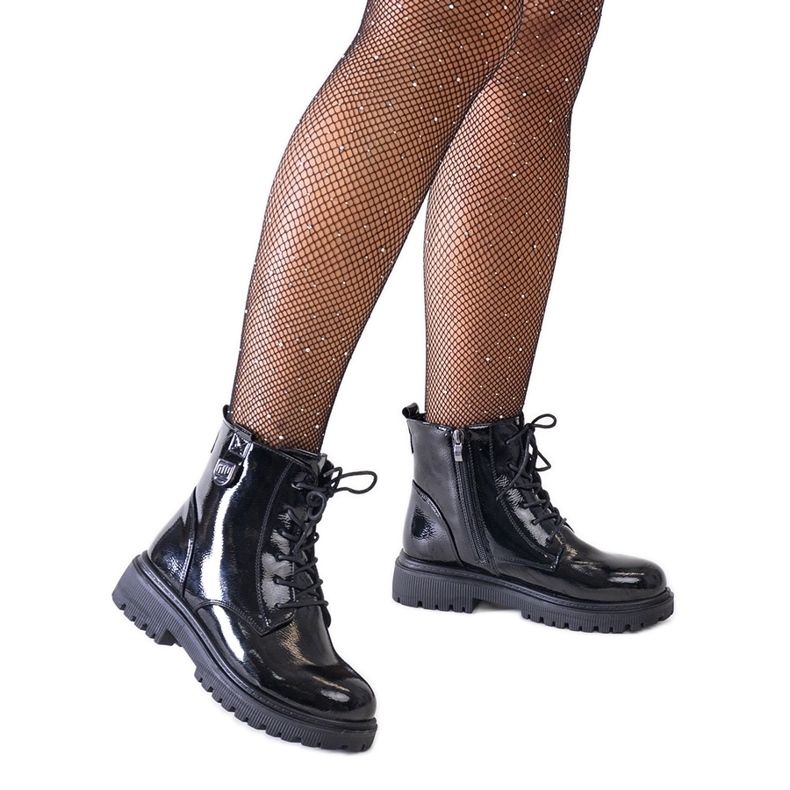 Black patent worker ankle boots on the Leonora platform