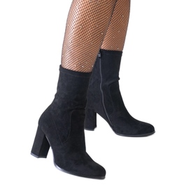 Black fitted high-heeled ankle boots made of eco-suede by Haner
